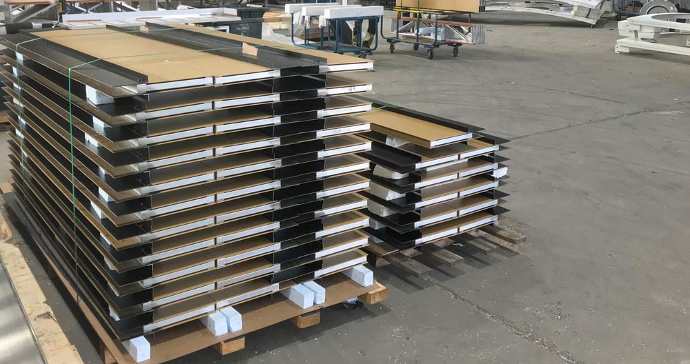 Facade Cladding Panels Stacked & Unwrapped - CLADDING SYSTEMS